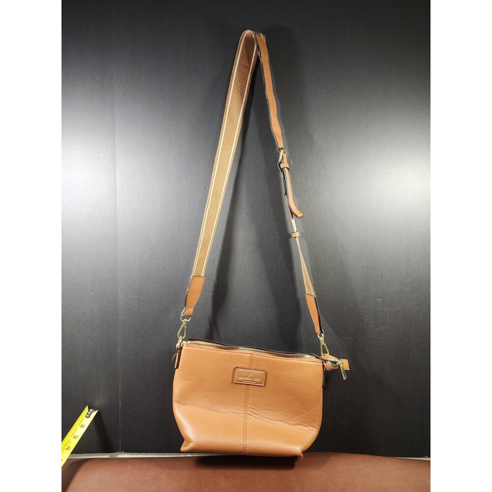 London Fog crossbody bag crafted in a camel tan pebble-grain texture